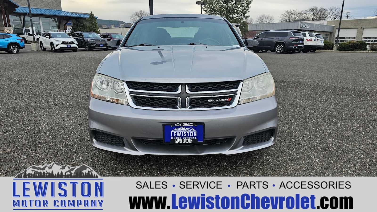 2013 Dodge Avenger — side profile view