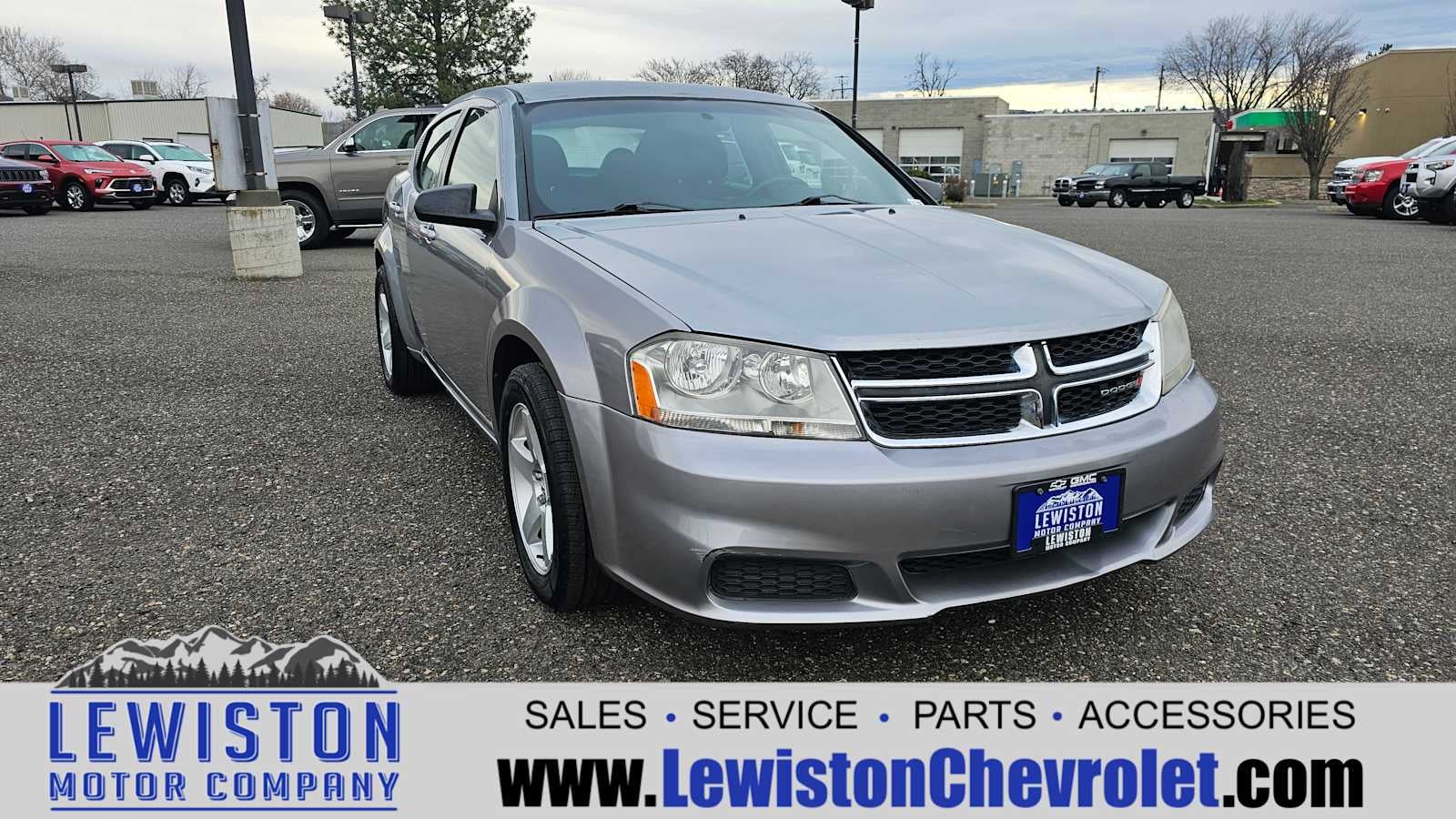 2013 Dodge Avenger — rear three-quarter view