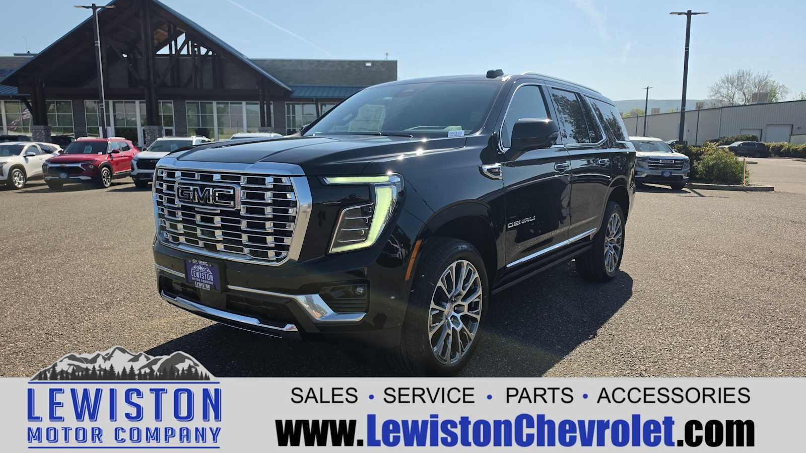 2026 GMC Yukon Denali in Onyx Black — front three-quarter view