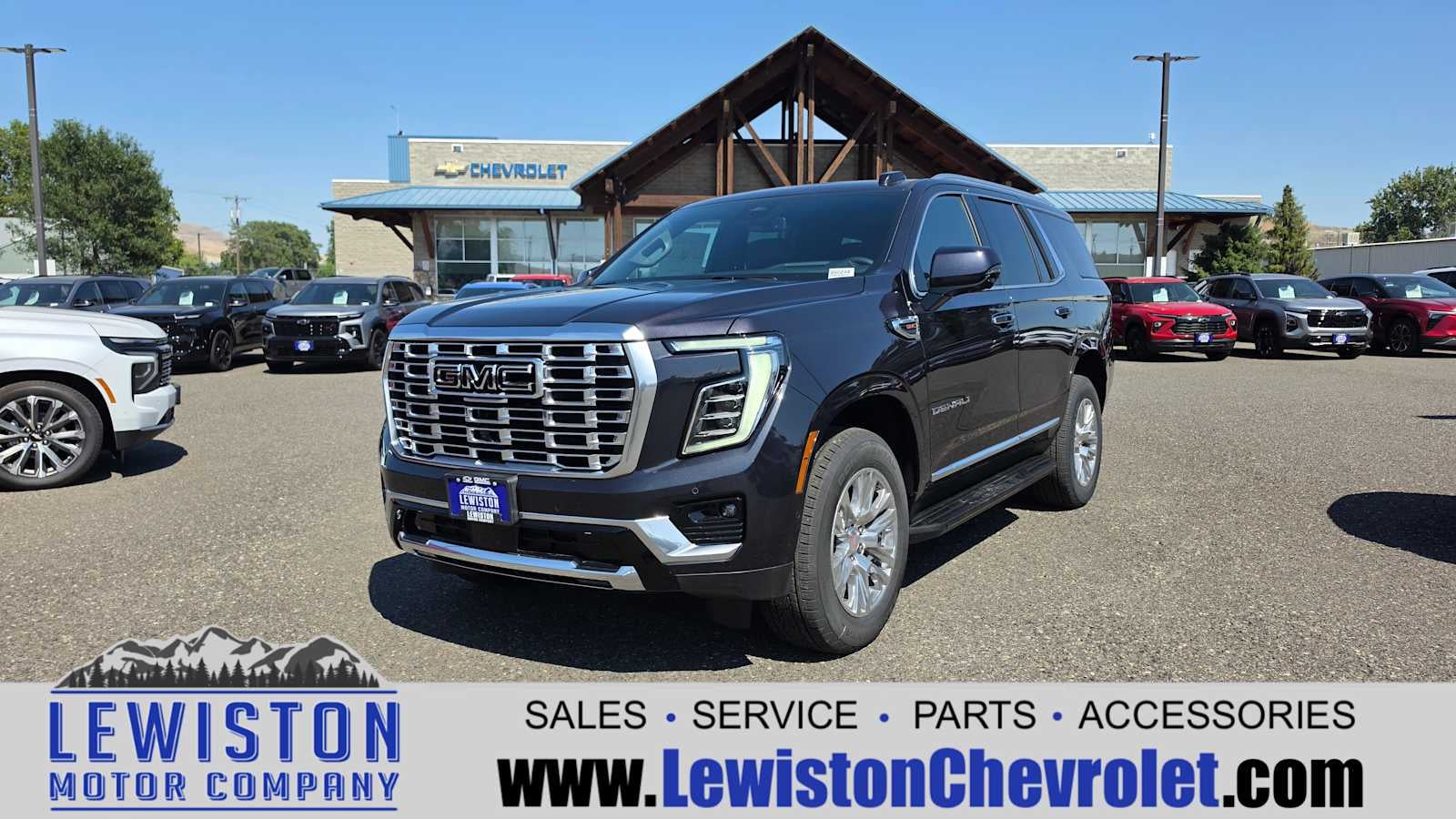 2026 GMC Yukon Denali in Titanium Rush Metallic — front three-quarter view