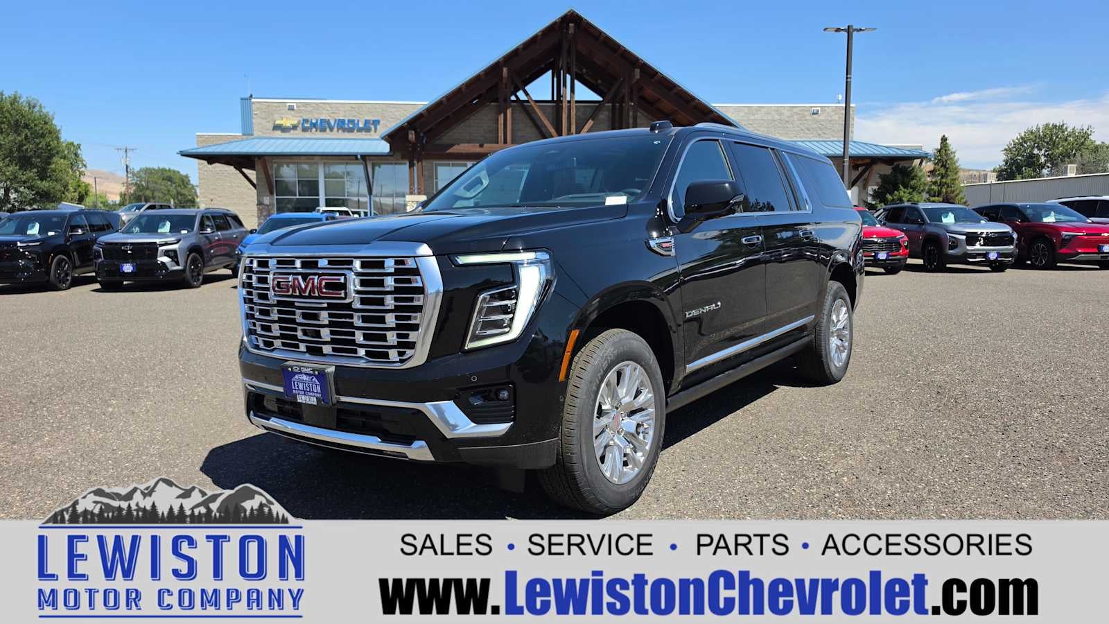 2026 GMC Yukon XL Denali in Onyx Black — front three-quarter view
