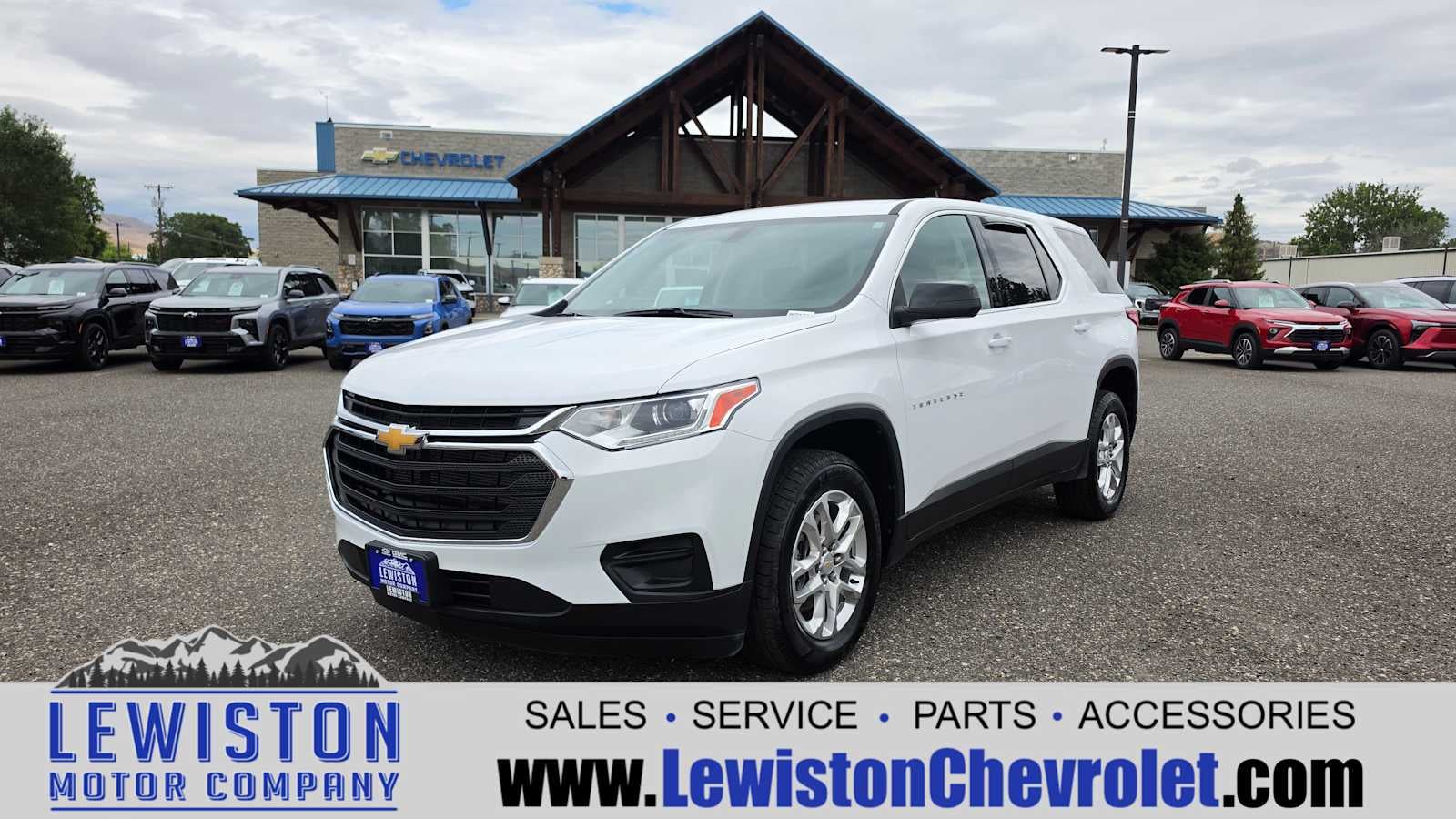 2021 Chevrolet Traverse LS in Summit White — front three-quarter view