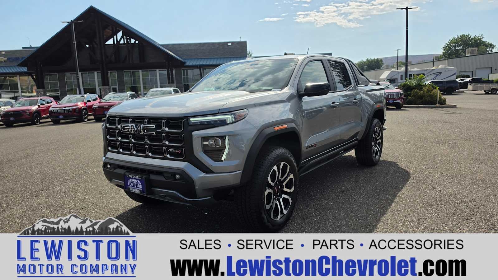 2026 GMC Canyon AT4 in Sterling Metallic — front three-quarter view
