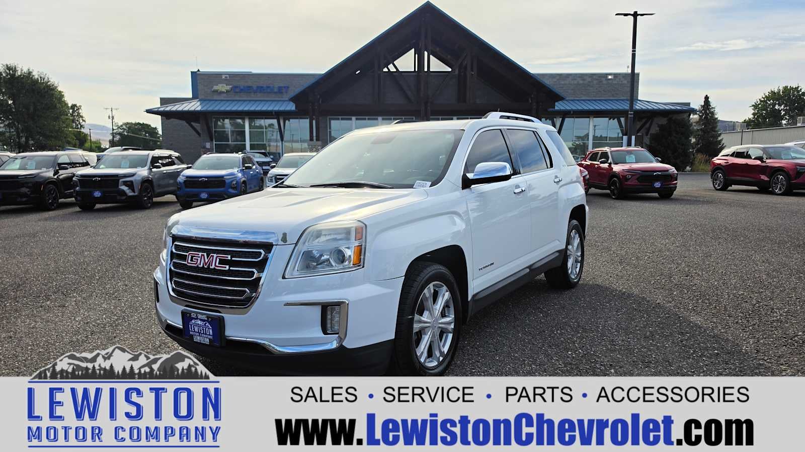 2016 GMC Terrain SLT in Summit White — front three-quarter view