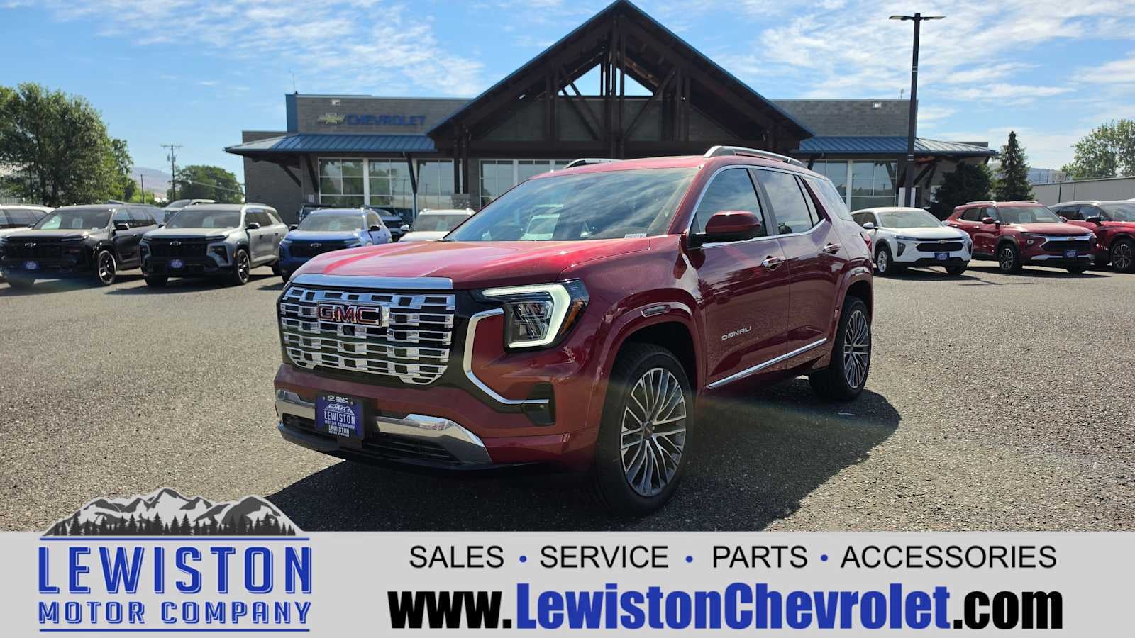 2026 GMC Terrain Denali in Volcanic Red Tintcoat — front three-quarter view