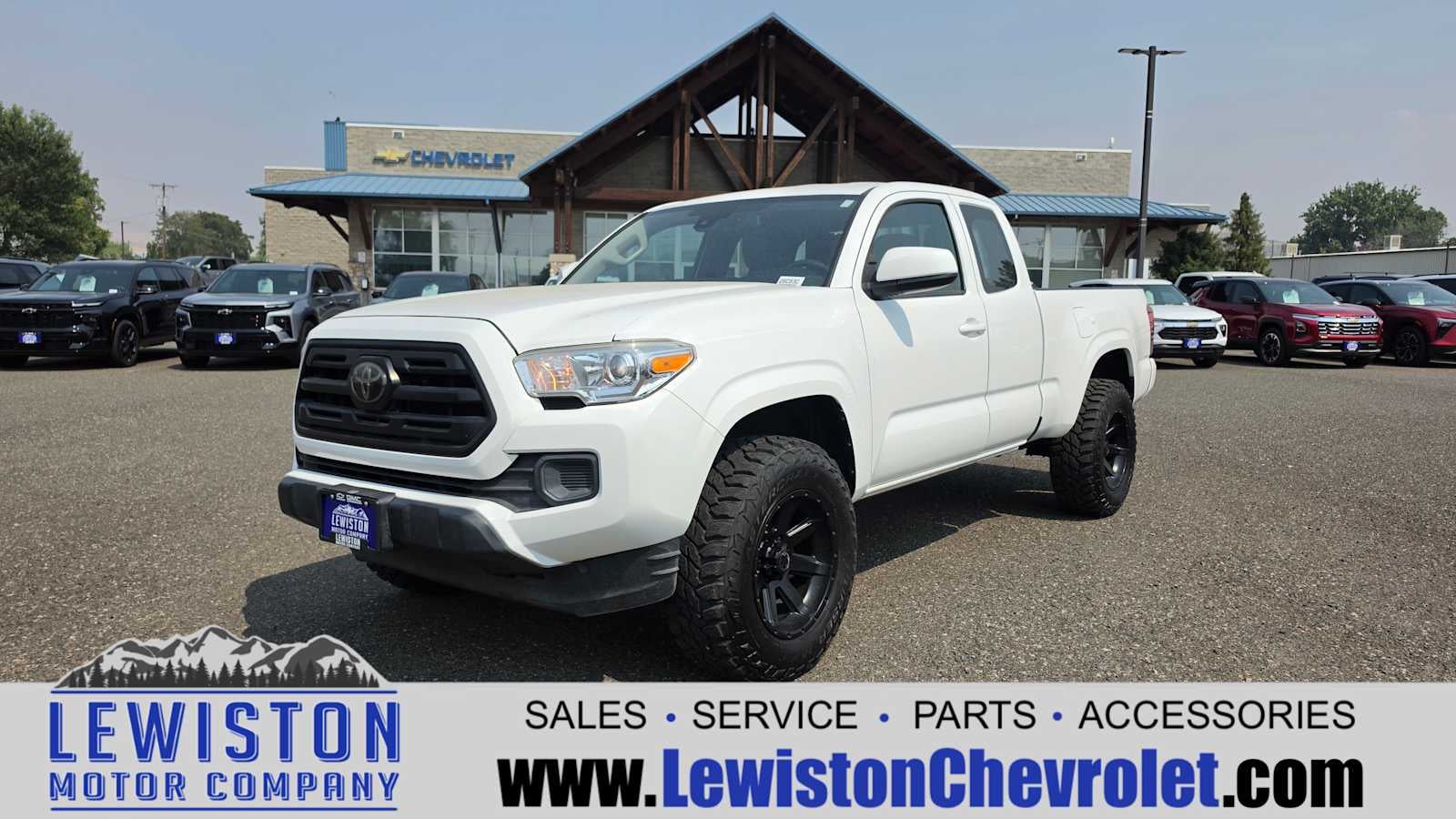 2018 Toyota Tacoma SR in White — front three-quarter view