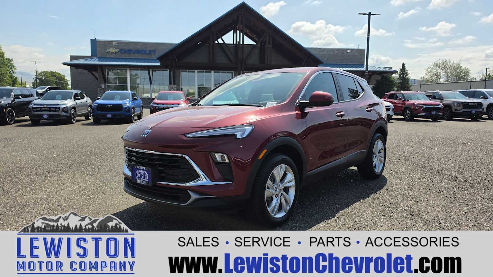 2025 Buick Encore GX Preferred in Cinnabar Metallic — front three-quarter view